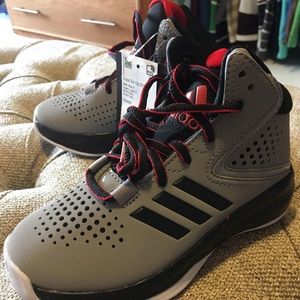 NWT kids adidas basketball shoes. 11k